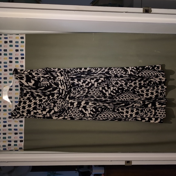 Sleeveless poly knit 49" long animal print - Picture 1 of 3